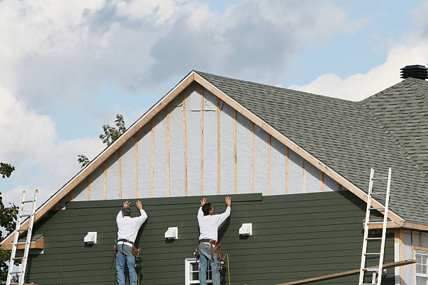 Professional Siding Installation technician working in Fombell, PA